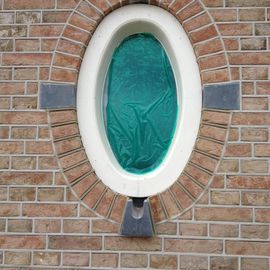 Voegwerk ovaal raam