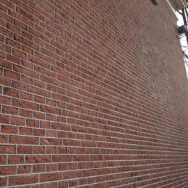 Voegwerk hoge muur